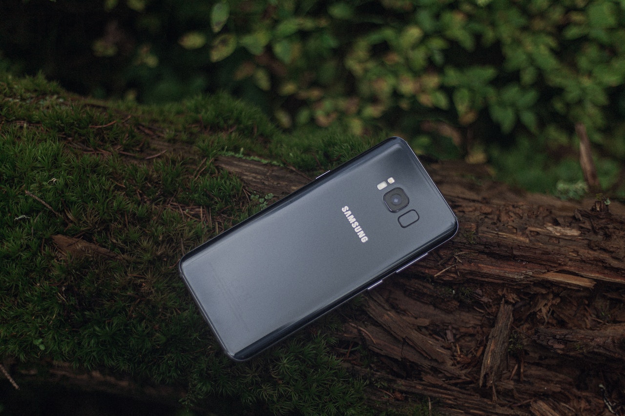 Samsung new phone is being photographed in the woods